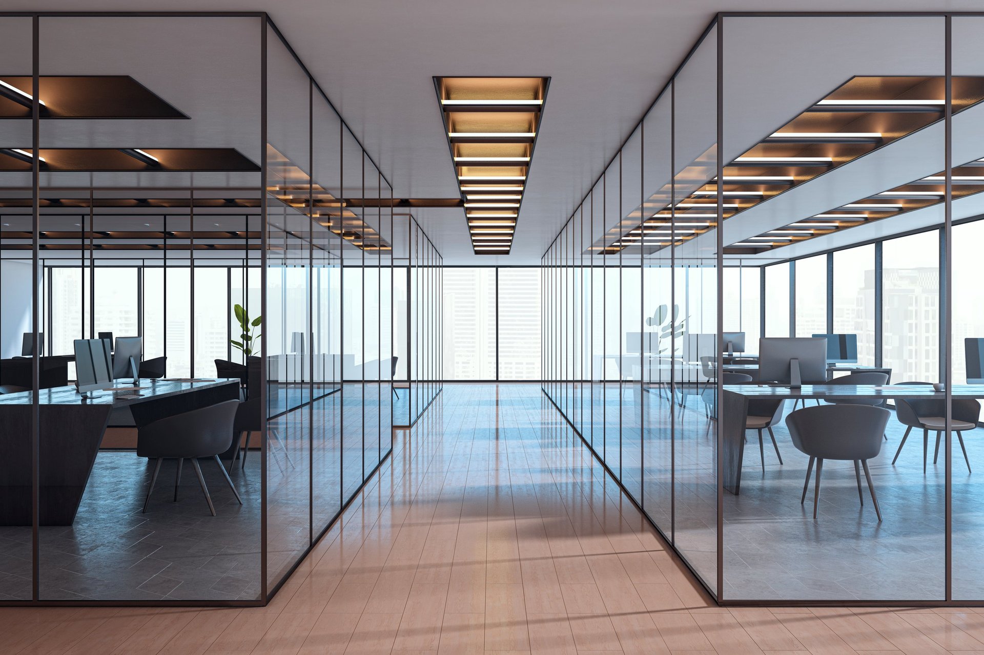 Contemporary empty office interior with glass partitions, stylish furniture and city view in background. Corporate workspace concept.